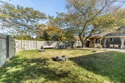 Island Dreams Coastal Cottage | Yard | Dogs OK