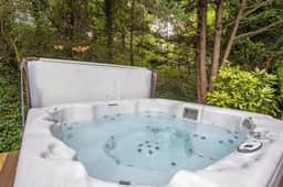 Flamingo Grove | 4BR w/ Hot Tub Near Downtown